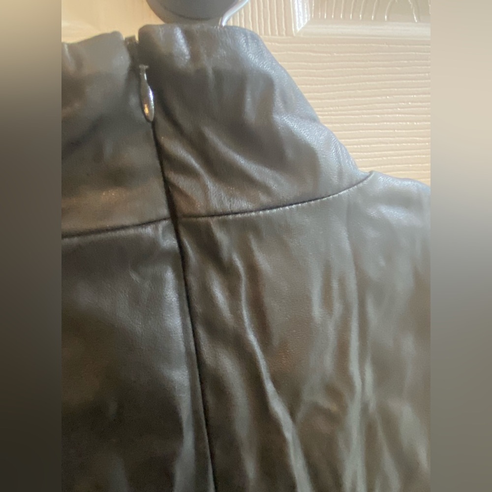 Black faux leather dress with front pockets